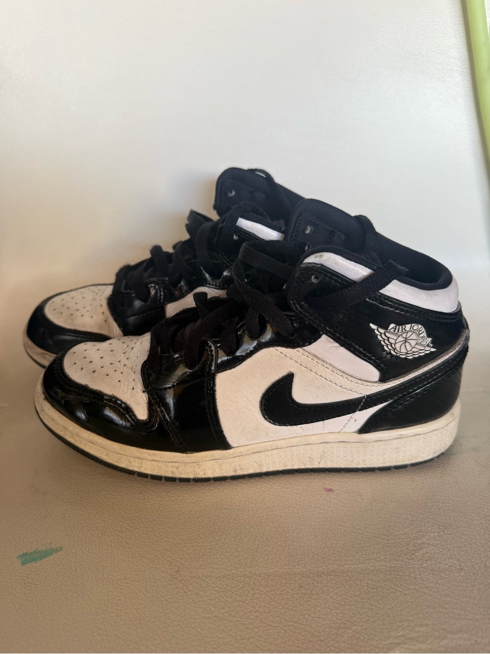 Nike Air Jordan Youth Black and White High-Top Sneakers with Swoosh